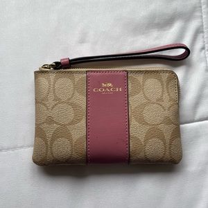 pink Coach corner zip wristlet